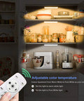 Under Cabinet Lights Wireless With Remote And Touch Control, Dimmable Battery Operated LED Closet Lights Stick On Kitchen Lighting With Timer, Multiple Color Options For Kitchen Shelves Hallways And Stairs, 4 Pack showing adjustable color temperature in use