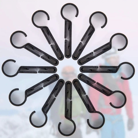 Circular arrangement of black headlamp clips for hard hats, durable plastic material, ideal for stable no slip fit on helmet