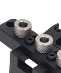 Close-up of the Precise Dowel Jig Kit showing adjustable aluminum drill guide with anodized surface and high strength bushings.