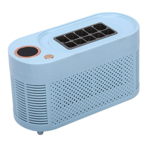 Portable Mini Ice Maker Countertop Chill Factory Makes 10 Clear Ice Cubes In 15 Minutes with sleek blue design and perforated sides.