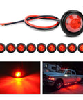 10 Pack 3/4 Inch Round LED Clearance Lights For Trucks RVs Cars Buses Trailers And Boats Front Rear Side Marker Indicator Bullets 12V Red 60 Lumen Output Surface Mount With Rubber Grommet Long Lasting displayed on a truck with glowing red light
