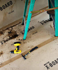 X Board Seam Tape Tan 1.89 Inch By 164 Foot Contractor Grade Adhesive For Quick Seam Sealing And Surface Protection. Tools nearby.