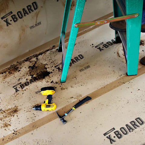 X Board Seam Tape Tan 1.89 Inch By 164 Foot Contractor Grade Adhesive For Quick Seam Sealing And Surface Protection. Tools nearby.