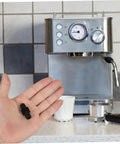 Person holding Rubber Insulation Cover For Espresso Machine Steam Wand Anti Scald Sleeve, Easy Install Replacement For Espresso Makers