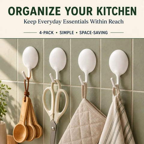 Heavy Duty Adhesive Wall Hooks For Bathroom And Kitchen No Drill Strong Sticky Hangers For Towels Coats Zero Hassle Residue Free 4 Pack on green tiled wall holding measuring spoons, scissors, and kitchen towels.