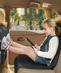Child using tablet next to 2 In 1 Car Seat Protector And Kick Mat With iPad Holder And Touchscreen Pocket Backseat Organizer.