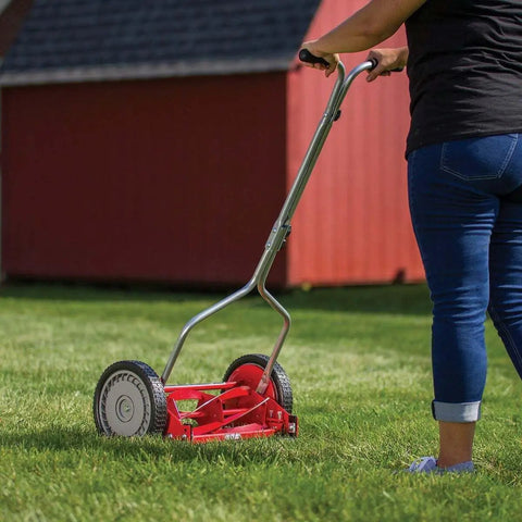 Person mowing lawn with 14 Inch Push Reel Lawn Mower With 5 Blade Ball Bearing Reel, Adjustable Cutting Height 0.5 To 1.75 Inches, Red