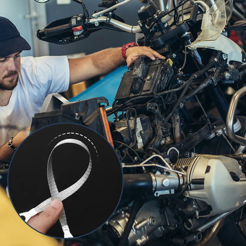 Mechanic working on motorcycle with focus on 14 Piece Ground Straps Set For Your Ride, 10 Inch And 12 Inch Engine Ground Strap Kit, Silver.