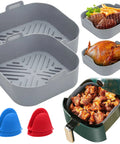 Reusable 8.1 Inch Silicone Air Fryer Pot Liners Set 2 Pack Square Oven Insert Easy Clean Food Safe Nonstick Bake Tray Improves Air Circulation For Crispier Results Includes Heat Proof Gloves shown with cooked food and gloves