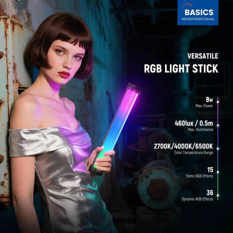 Model holding Basics 12 Inch Magnetic RGB Light Wand Dimmable 8W LED With 51 RGB Modes And 460 Lux At Half Meter in dim studio