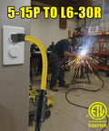 Heavy Duty Nema 5-15P To L6-30R Generator Welder Adapter Cord delivering 125 Volt 15 Amp power plugged into a wall outlet.