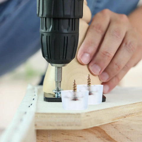 Installing Round Screw On Chair Leg Glides For Indoor Tables And Chairs No Slip PVC Furniture Feet Pads with a drill.