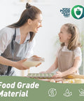 Mother and daughter smiling while using Top-Shelf Silicone Ice Cube Trays 4 Pack With Tight-Fitting Lids Easy-Peel Design.