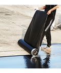 Heavy Duty Waterproof Roofing Tape Roll For Asphalt Shingle Repair being unrolled, showcasing its thick foil backing and rubberized design.