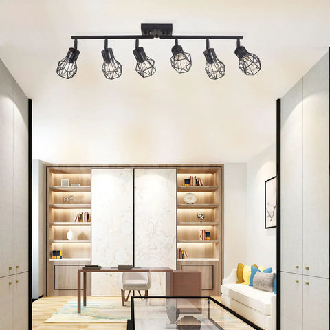 Black 6 Light Farmhouse Track Lighting Fixture With Metal Cage Design installed on ceiling in modern living room