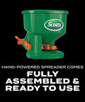 Hand Powered Spreader For Grass Seed And Lawn Fertilizers Salt And Ice Melt, green and orange handheld spreader.