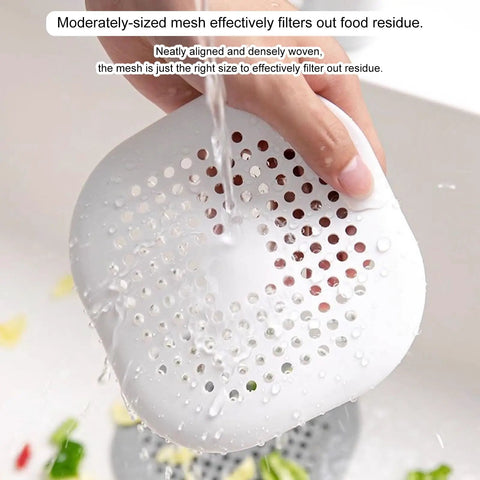 A Total Game Changer 3 Pack Silicone Drain Catchers For Sink And Tub Reusable Hair Strainers With Mesh Filter, close-up of mesh rinsing.