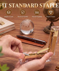 Hands loading the Gold Desk Stapler Set With Acrylic Finish, 20 Sheet Capacity, Includes Staple Remover And 1000 26 By 6 Staples, Dope Sleek And Ultra Compact Office Organizer For Home Office And Workplace