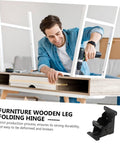 Person installing folding table hinge replacement kit for durable furniture DIY projects