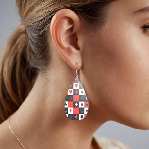 Dope Poker Suit Dangle Drop Earrings Featuring Bold Grid Card Pattern Silver Plated Hooks Lightweight Acrylic Teardrops Hypoallergenic worn on ear of woman.