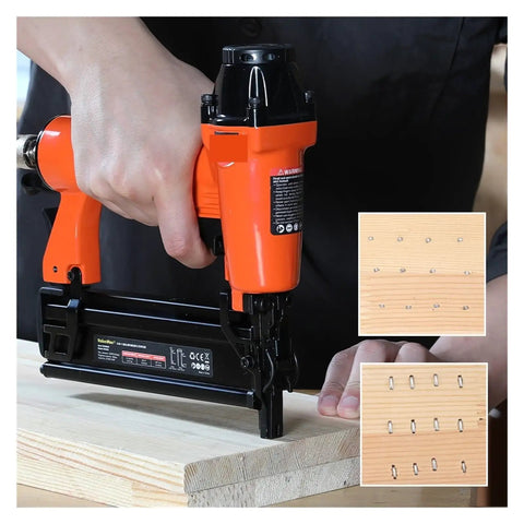 Person using Totally Badass Pneumatic Brad Nailer And Furniture Staple Gun on wood, showcasing staple application.