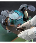 Gloved hands using All In One 6 Inch Bench Grinder Polisher For Metal Stone And Woodworking, Heavy Duty DIY Tool with sparks.