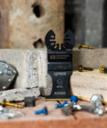 Badass Reciprocating Saw Blades One Three Eighth Inch Carbide Tipped Titanium Coated Metal Cutter Rips Clean Through Rusted Bolts Copper Pipes And Nail Embedded Lumber Like A Boss Two Pack on a workspace with screws and bricks.