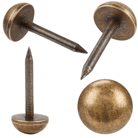 Top Shelf Solid Brass Antique Upholstery Tacks With Realistic Bronze Hue Heavy Duty Furniture And Carpet Thumb Tacks Half Inch showing detailed cap and point.