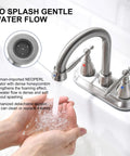 Brushed Nickel Two Handle Centerset Bathroom Faucet For 4 Inch Sinks showing gentle water flow on hands.