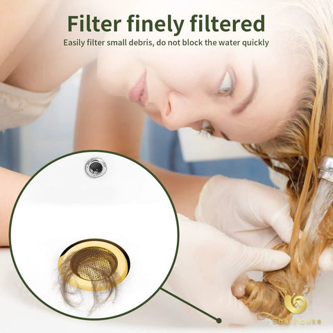 Two Pack Stainless Steel Kitchen Sink Strainers With Gold Finish, 4.5 Inch Wide Rim, capturing hair debris in sink.