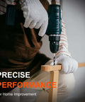 COMOWARE Masonry Drill Bit set, green cordless drill drilling a wooden block with white-gloved hands