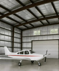 Heavy Duty 24 By 50 Ft Reflective Insulation Roll With R17 Foam Core Radiant Barrier in a spacious hangar with a plane.