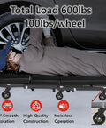 Person using 2.5 Inch Caster Wheels Set Of 12 For Creeper And Mechanics Stool Replacement under car; 360-degree rotation visible.