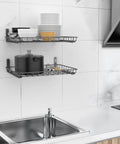 Two Pack 12 By 24 Inch Wall Mounted Shelves For Garage Closet And Laundry Room Heavy Duty Floating Shelves With Durable L Shaped Brackets Holds Up To 60 Lbs Easy 16 Inch Stud Installation Black, installed above kitchen sink with dishware and pots.