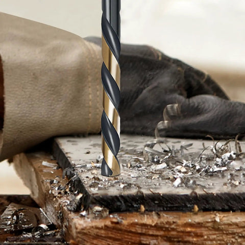 Kickass Heavy Duty Cobalt Drill Bit Set With 135 Degree Sharp Tips And Sleek Black Gold Finish drilling into wood with metal shavings.