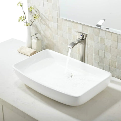 All In One White Ceramic Vessel Sink And Brushed Nickel Faucet Combo For Bathroom Vanity, water flowing into rectangular sink