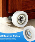 Close-up of Ten Pack Nylon Guide Pulley Rollers With Ball Bearings slick action under furniture, ideal for 10mm shafts, 38mm wheels.