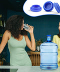 Two women with 5-gallon water jug; inset shows blue leak proof silicone replacement caps pack of 6 for 55mm bottles