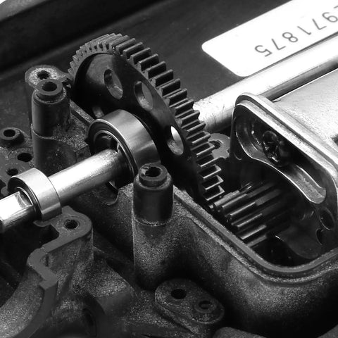 Close-up of 48DP Metal Pinion Gear Set for 1/18 RC Cars with 2.3mm Shaft, installed in transmission showcasing 14T gear.