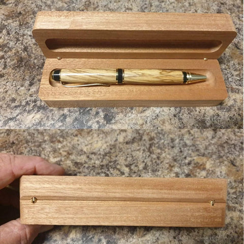 Wooden pen box with concealed brass barrel hinges, showcasing the sleek storage for a handcrafted pen