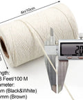 Close-up of white cotton rope roll with caliper showing 2mm diameter, part of Three Rolls Of 984 Ft Twine String 2mm Natural Jute And White Cotton Rope For Crafts DIY Projects Gardening Gift Wrapping And Decoration Packing Bulk.