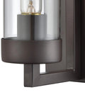 Close-up of Holbrook One Light Sconce in oil rubbed bronze with clear blown glass, showcasing bulb holder.