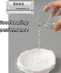 Tough As Nails Waterproof Sealant Clay For Quick Fix Wall And Drain Patching White Two Pack showing water sealing demonstration.