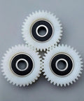 3-Piece Nylon Planetary Gear Set With 36-Tooth Gears For E Motors, top view, showing circular arrangement of white nylon gears