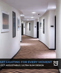 Interior hallway lit with Six Inch LED Dimmable Downlight With 90 Minute Emergency Battery Backup And Ultra Slim Recessed Can Light.