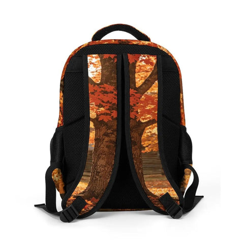 Back view of Autumn Red Maple Log Cabin Print Unisex Backpack with large capacity, durable polyester build, and breathable comfort.