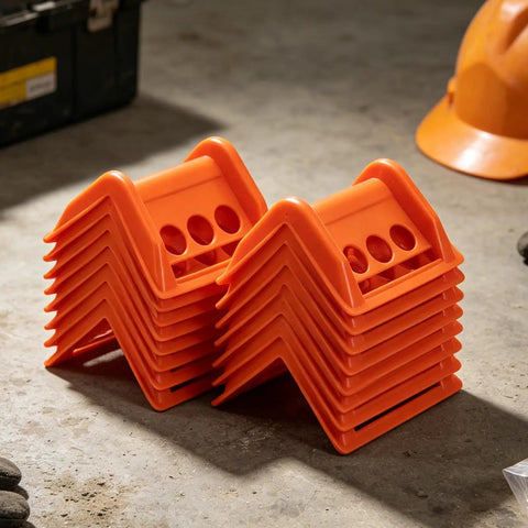 Orange 20 Pack Plastic Flatbed Edge And Corner Protectors For Trucks stacked in workshop