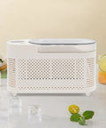 Fast Freeze Mini Countertop Ice Maker features a clear viewing lid, compact design perfect for home bars and road trips.
