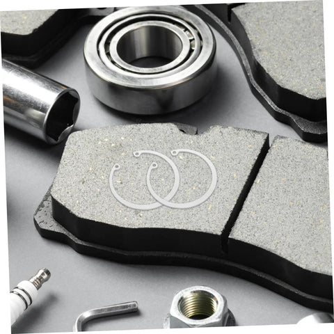 Five Piece Stainless Steel Snap Ring Set C Type Elastic Retaining Clips For Grooved Shafts on brake pad surface