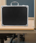 Slick Aluminum Alloy Toolbox Briefcase With Heavy Duty Hard Shell Design For Hand Tools Camera Gear And Tech Essentials Portable Equipment Rig For Pros On The Go on a desk.